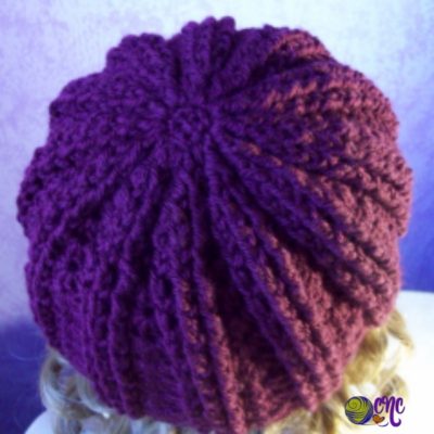 Top View of a ribbed hat modeled on a mannequin.