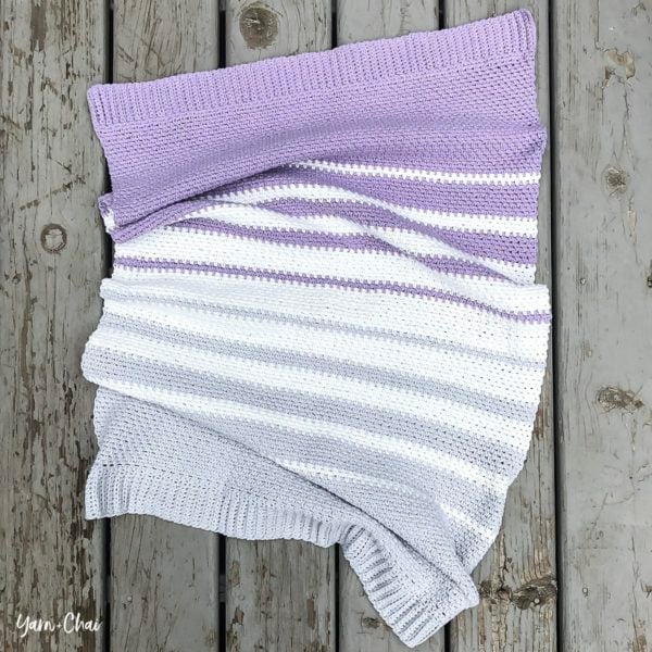 Striped linen stitch crochet blanket.