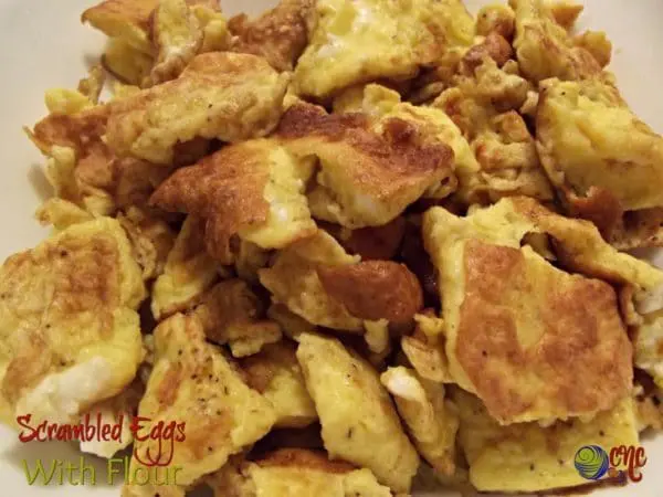 Bite-sized scrambled eggs with flour, nicely browned.