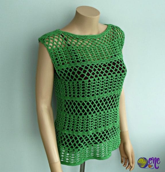 Free crochet pattern for a summer lace top shown at an angle from the top and side to show off the invisible seam.