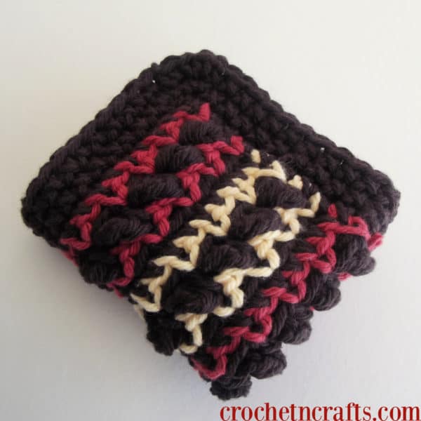 Textured Stripes Dishcloth pattern shown folded up and ready for gifting.