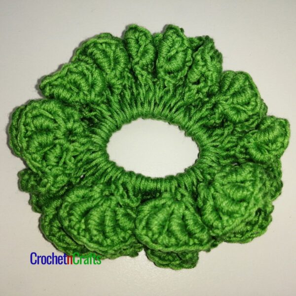 Crochet hair scrunchie worked up in the bullion stitch.