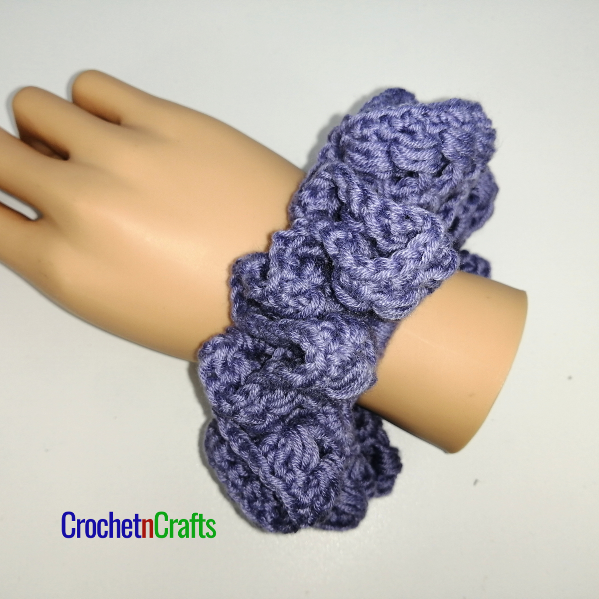 Crochet hair scrunchie pattern worked with the slanted cluster using Cotton Fair Yarn.