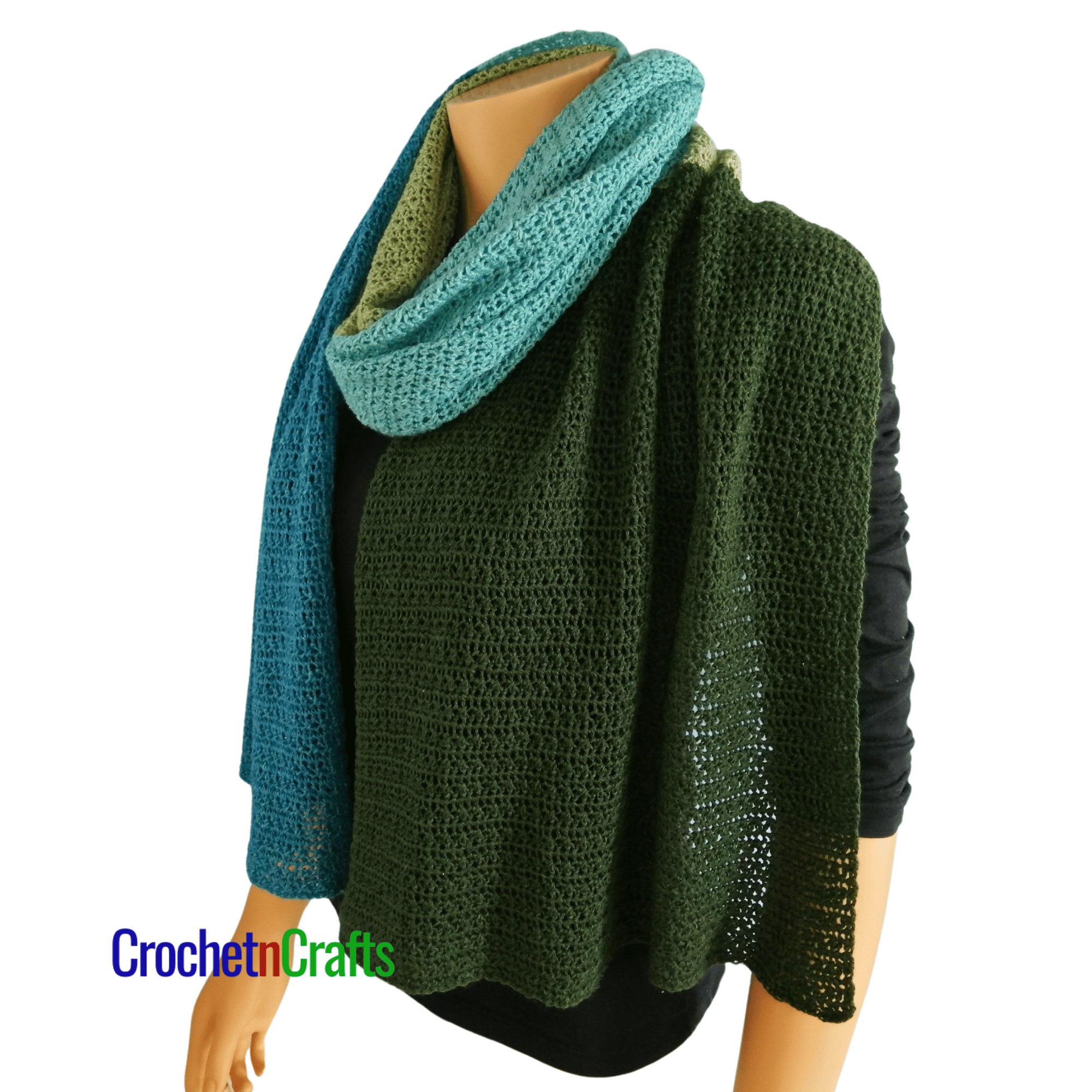 A crochet shawl is shown on a mannequin.