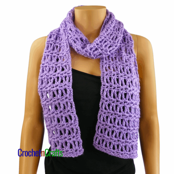 Crocheted scarf shown on a mannequin. Front View