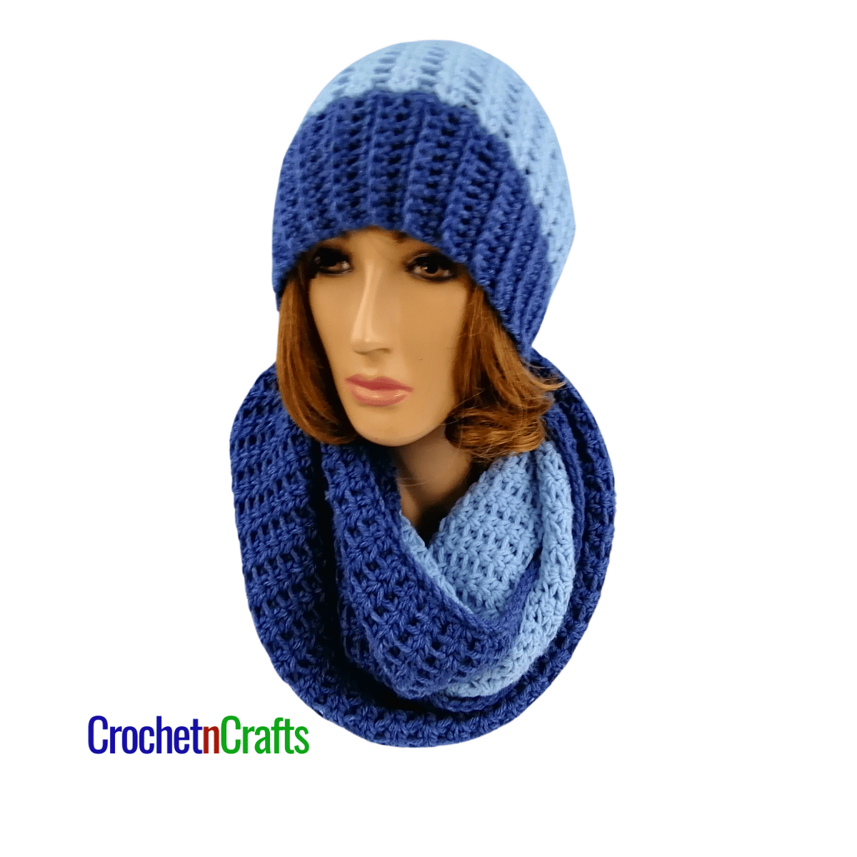 A crochet cowl wrapped cozy around the neck and a matching hat.