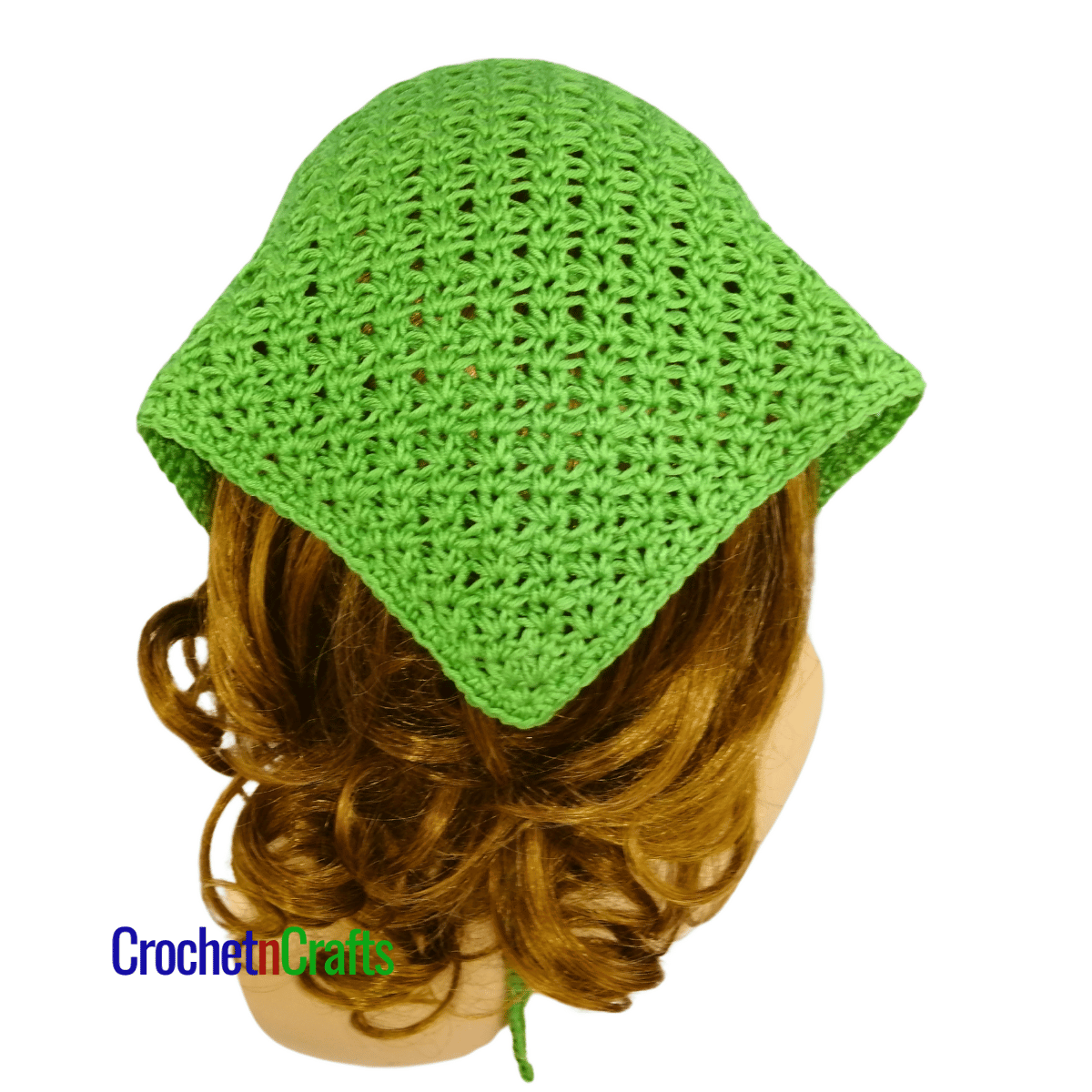 Crochet kerchief shown on a mannequin - back view.