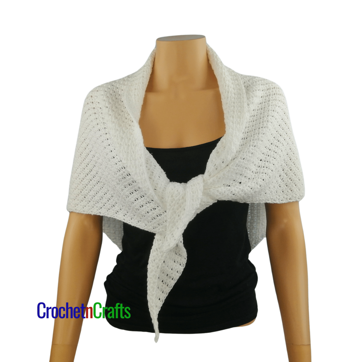 Crochet shawl shown on a mannequin - tied at the front.