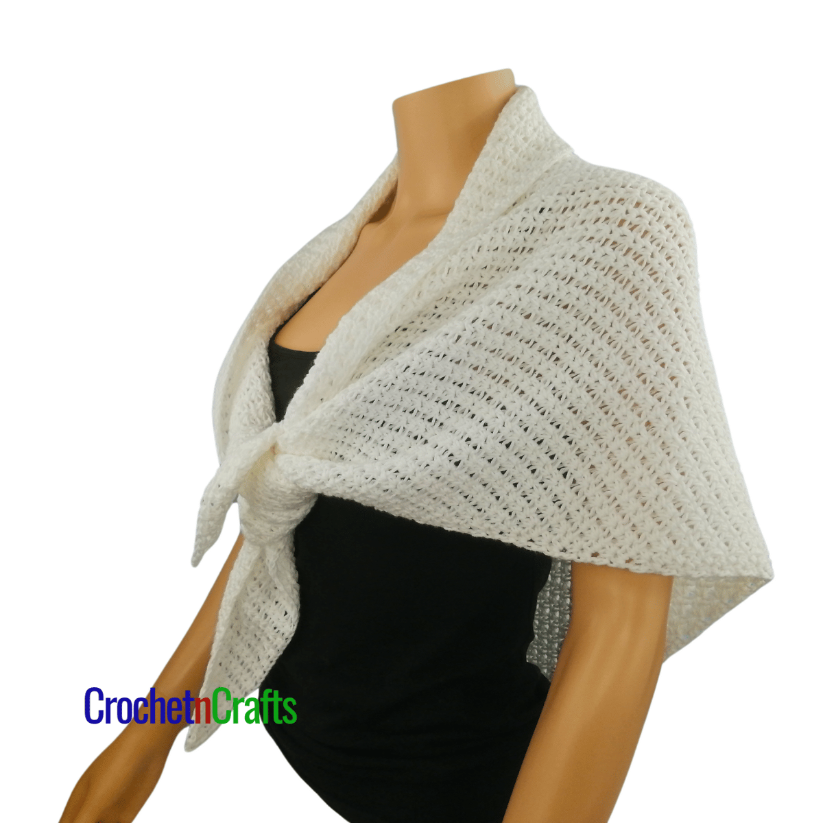 Crochet shawl shown on a mannequin - tied at the front - side view.