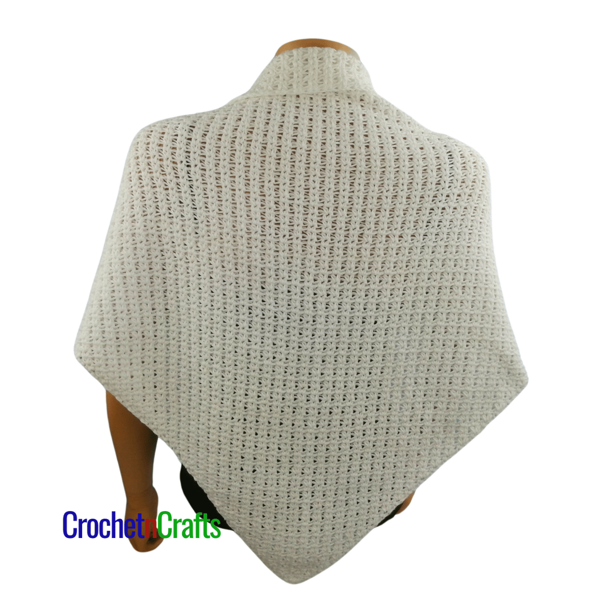 Crochet shawl shown on a mannequin - back view.