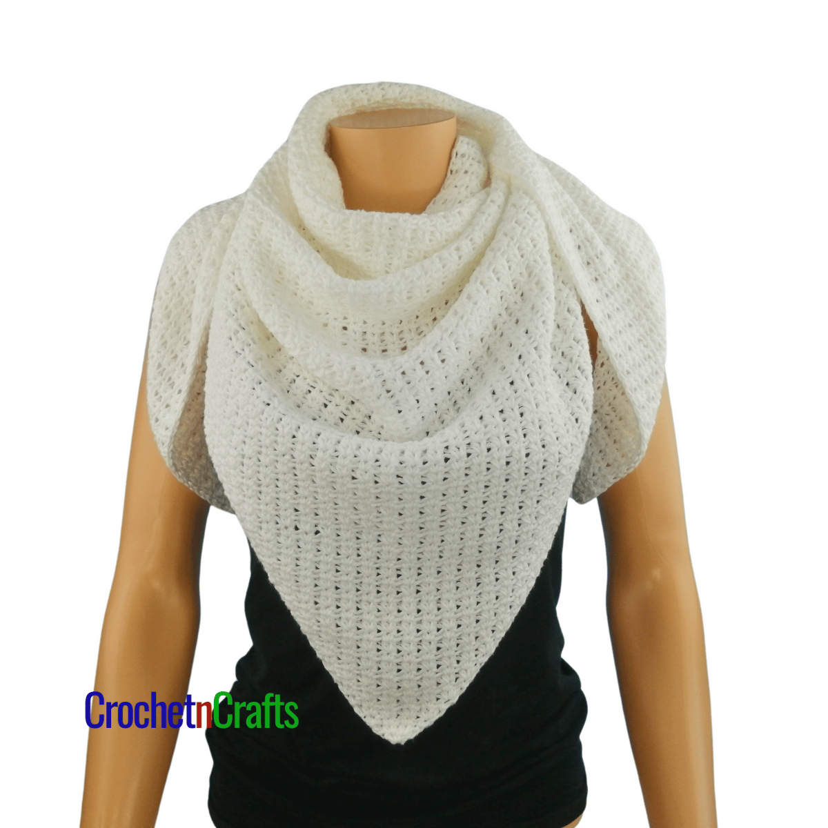 Crochet shawl shown on a mannequin - front view.