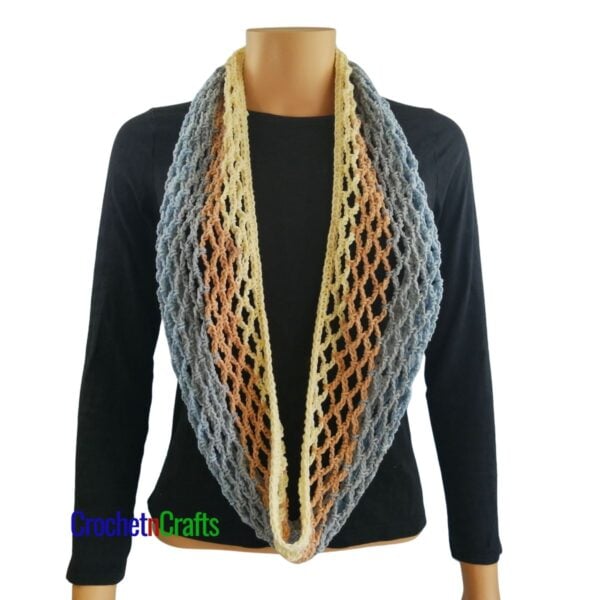 Crochet diamond mesh cowl worn long like a scarf.
