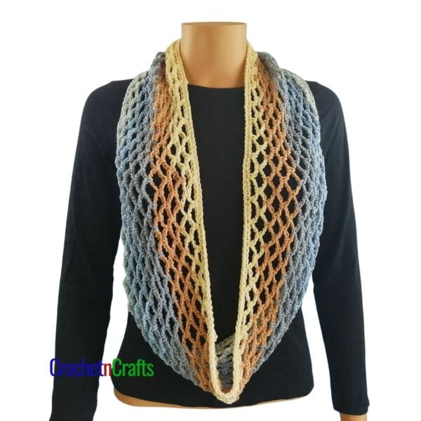 Crochet diamond mesh cowl worn long like a scarf.