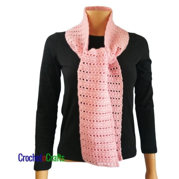 A crocheted scarf tied at the front.