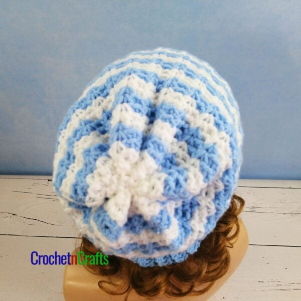 Striped crochet hat shown from the back.