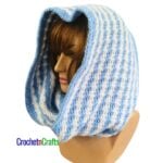 A crocheted cowl worn as a hooded cowl.