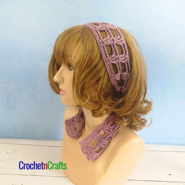 Crochet Hair Scarf Shown on a Mannequin.