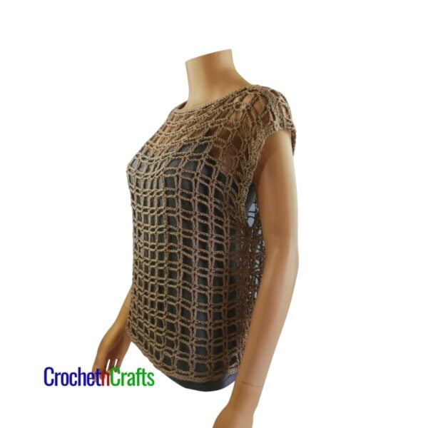 Light and lacy crochet summer top shown on a mannequin.