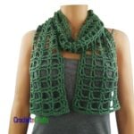 A light summer crochet scarf wrapped loosely around the neck.