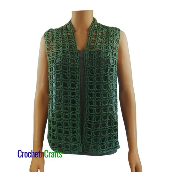 A light summer crochet scarf draped over the shoulders.