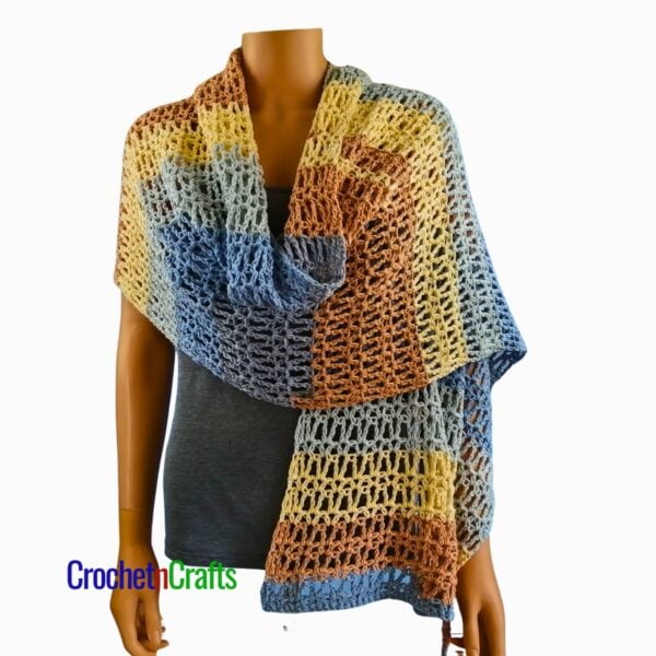 Crochet Prayer Shawl Pattern - Vienna The crocheted shawl is draped over a mannequin.