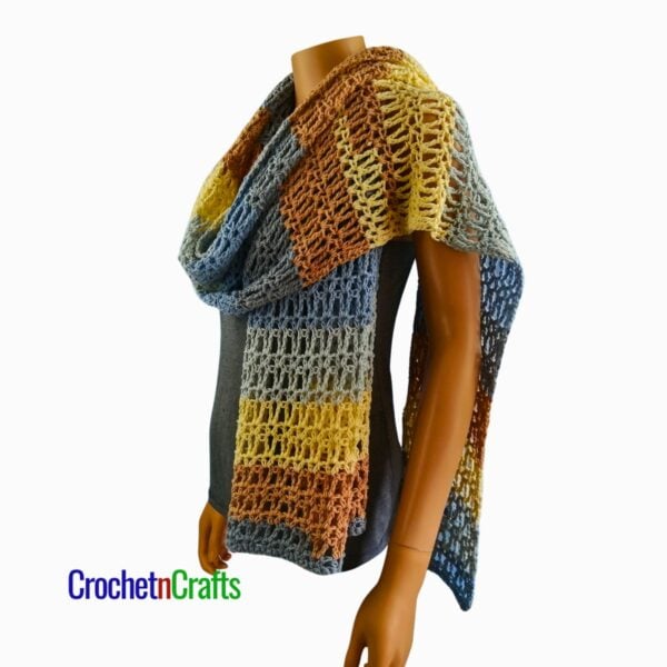Crochet Prayer Shawl Pattern - Vienna The crocheted shawl is draped over a mannequin.