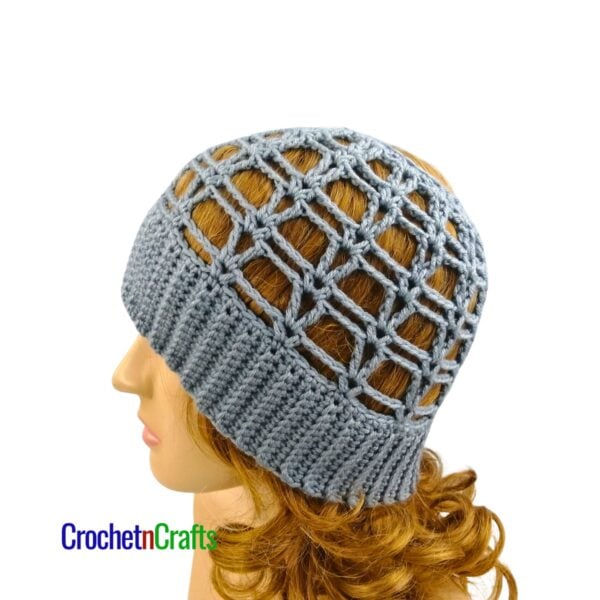 Crochet Ponytail Beanie Pattern - Vivi - Worn on a mannequin