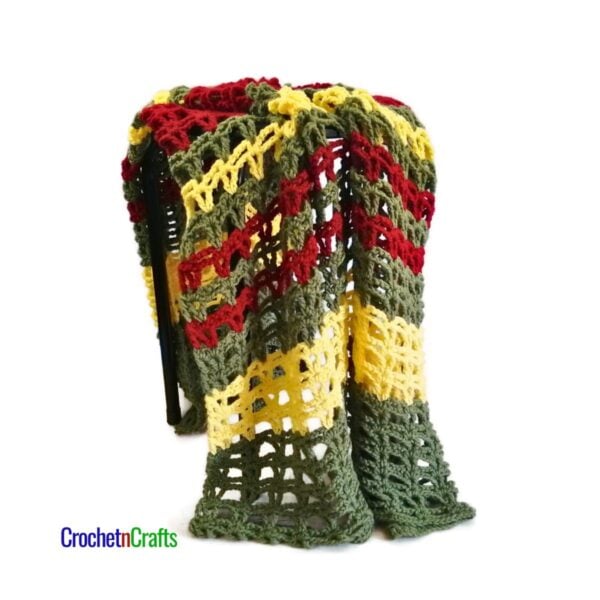 Quick Crochet Blanket - Vivi - Draped over a chair.