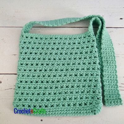 Crochet messenger laid flat.