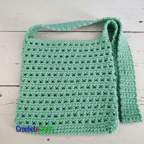 Crochet messenger laid flat.